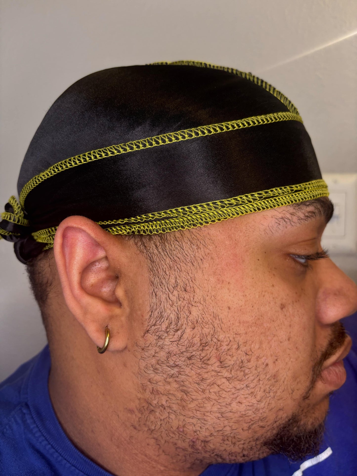 Black silky with yellow stitching