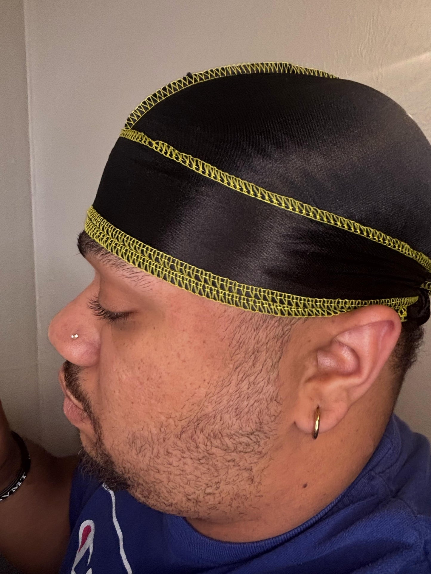 Black silky with yellow stitching